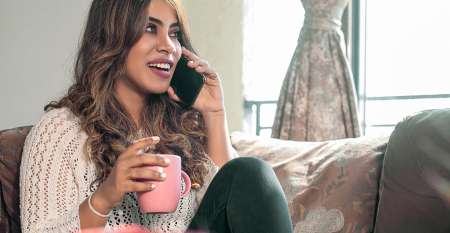 Smiling woman talking on mobile