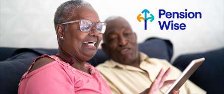 Older couple using tablet, with Pension Wise logo Older couple using tablet, with Pension Wise logo